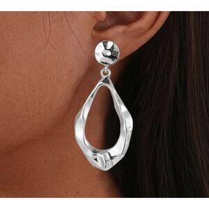 Clip on 2 1/2" silver hammered odd shaped pointed dangle earrings